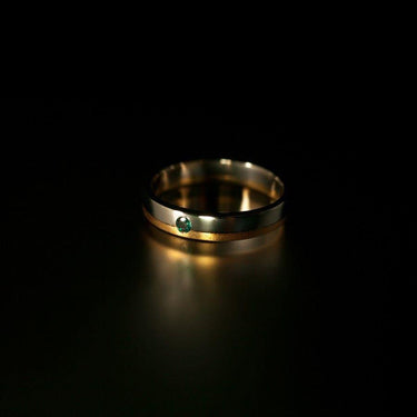 18k white and yellow gold wedding band with natural alexandrite gemstone